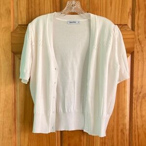 Women’s size medium Jasambac cream colored short sleeved shrug